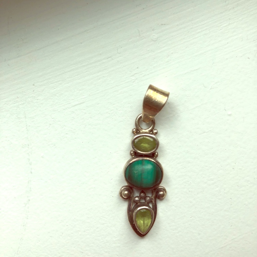 Sterling silver pendant with green  stones